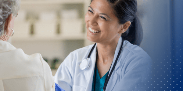 Doctor smiling at patient 